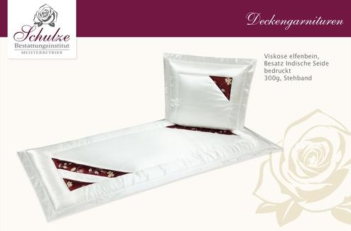 Elegantes Bettwäsche-Set aus ivoryfarbenem Viskose mit bedrucktem seidenen Besatz und rotem Design.